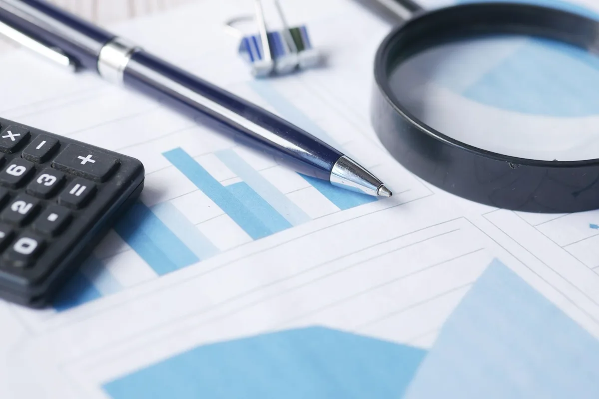 Documents and pen on a desk for financial planning
