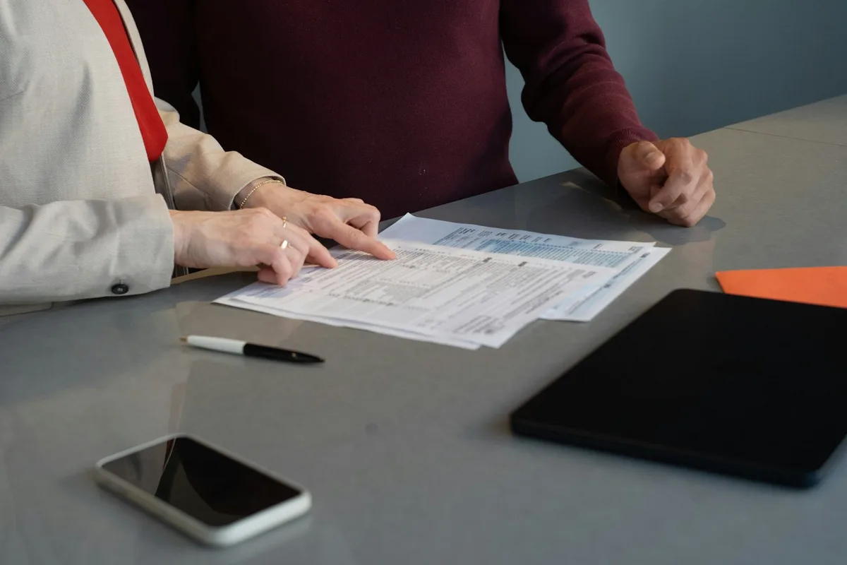 Insurance claim documents and paperwork being reviewed