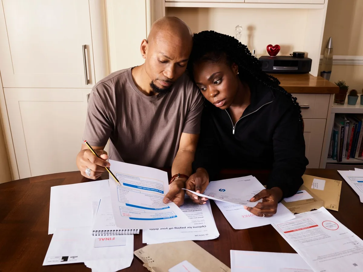 Family reviewing financial protection documents together at home
