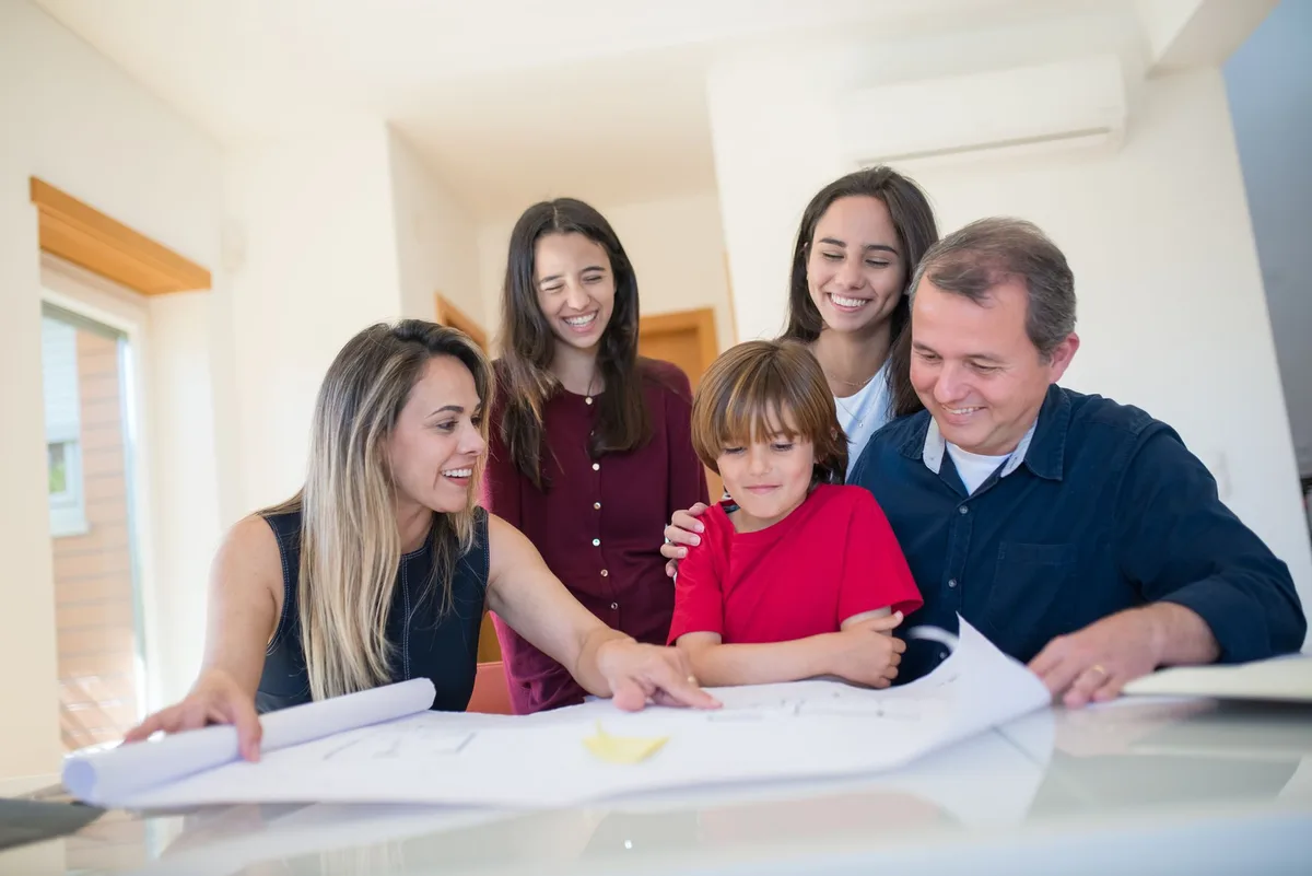 Australian family reviewing life insurance documents together at home