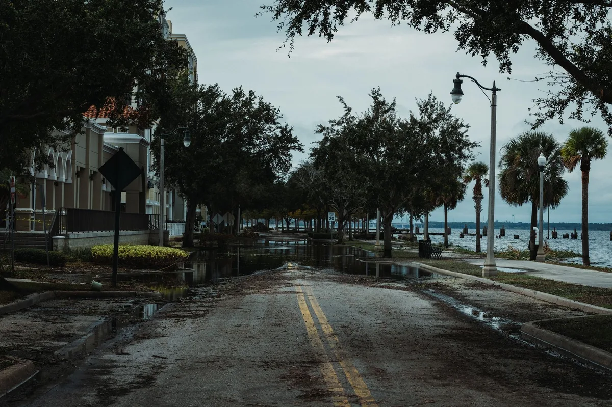 Flooded residential street showing water damage from severe weather in Australia