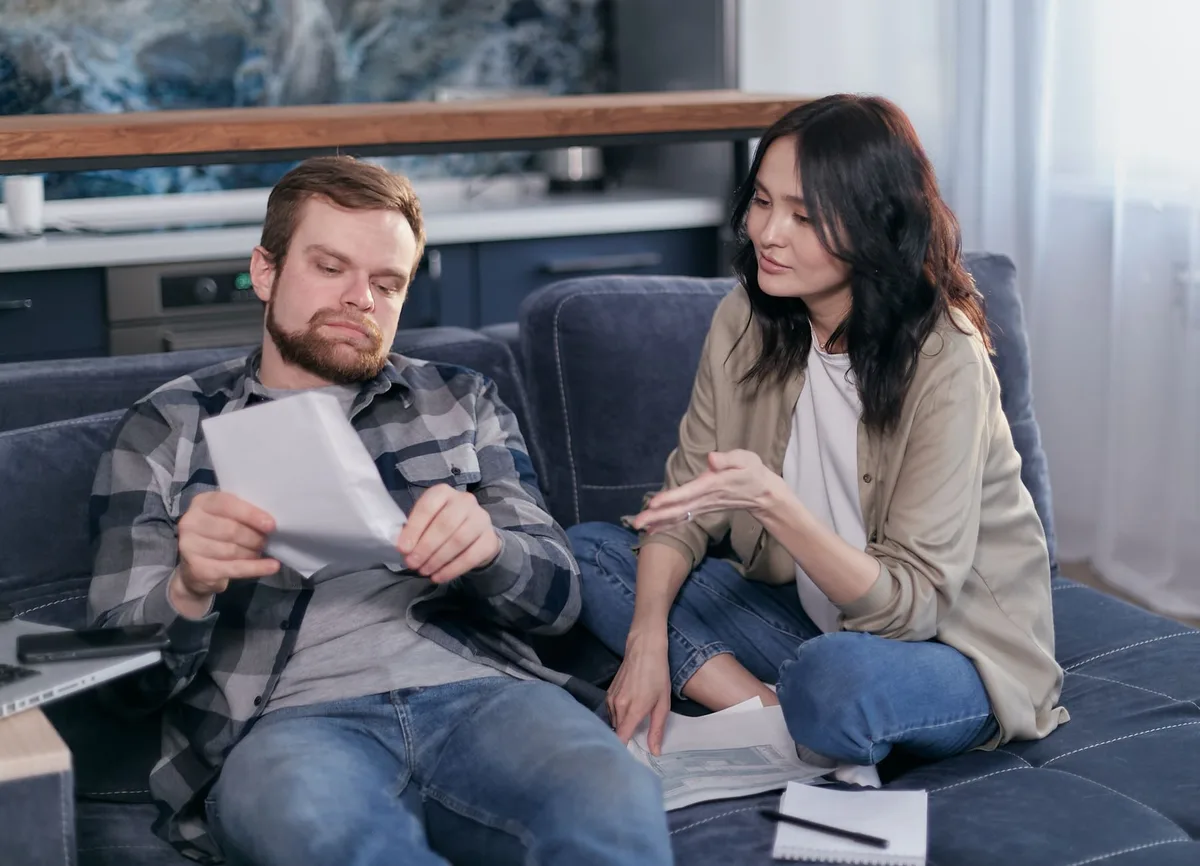 Family together reviewing important documents