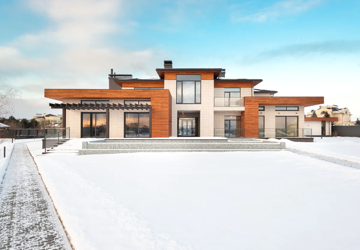Modern Canadian home exterior representing homeownership financial pressures