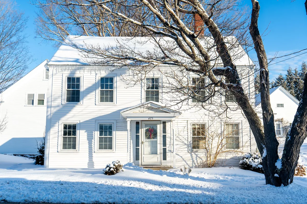 A residential house exterior representing winter home insurance preparedness