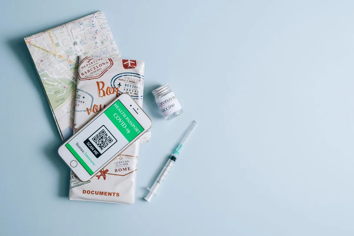 Medical stethoscope and health documents representing travel health coverage