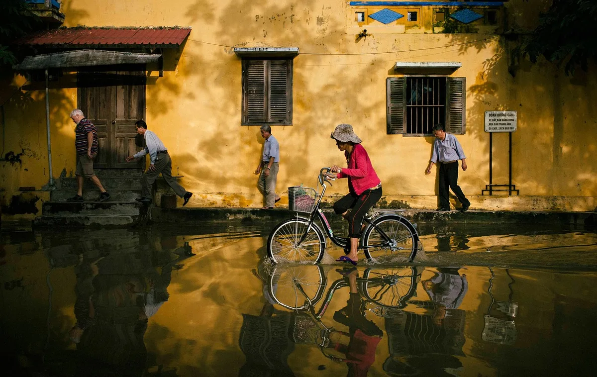 Flood water surrounding homes after heavy rain, representing weather risk and home insurance in Canada.