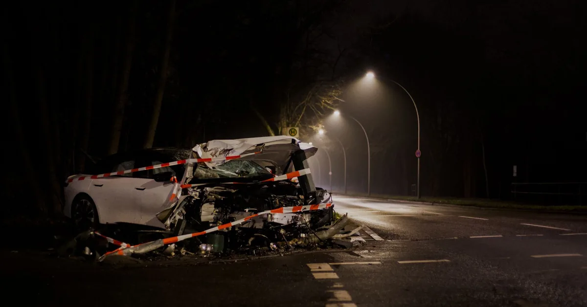Calculator on insurance documents representing auto liability coverage planning