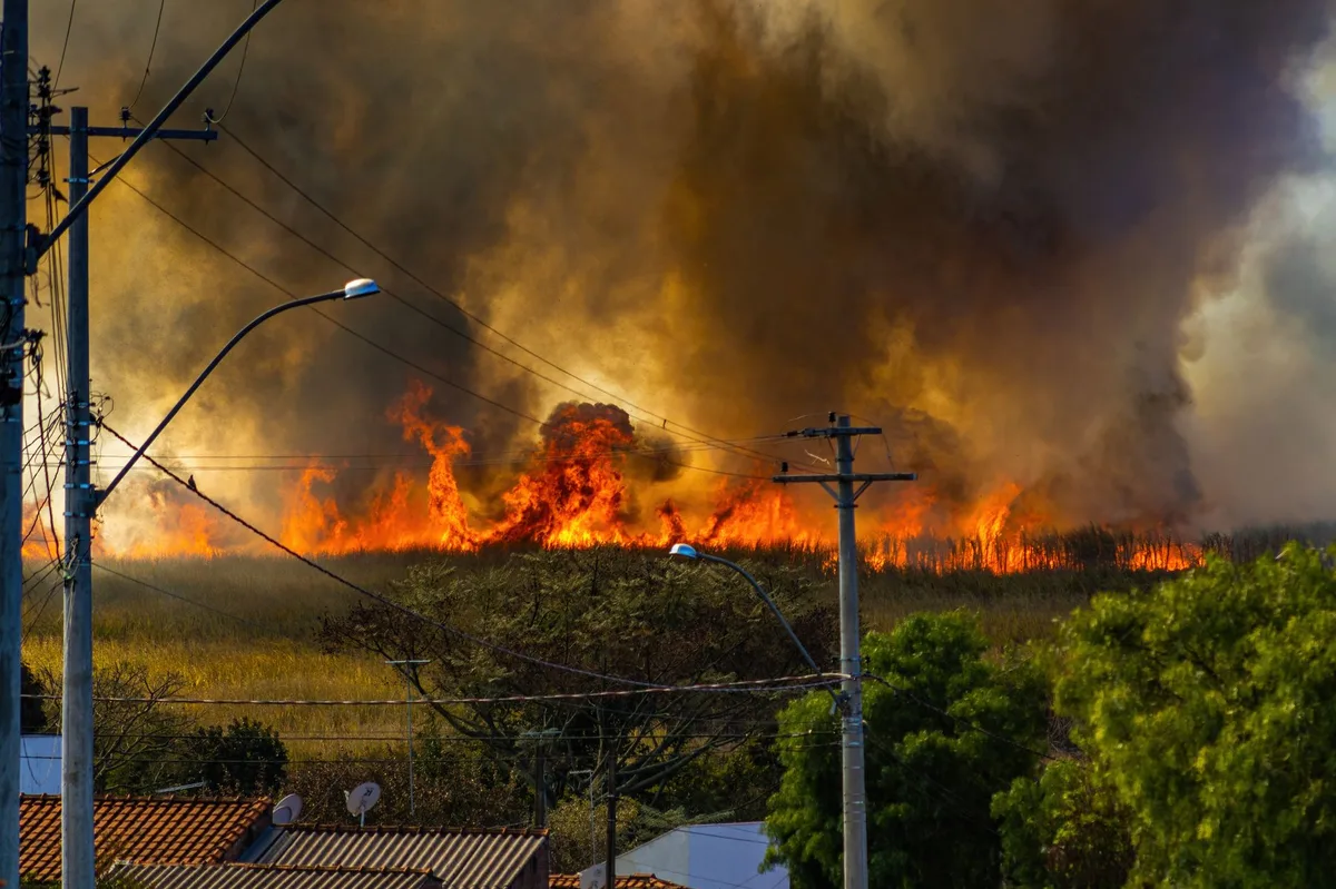 Residential home exterior representing property at risk during wildfire season
