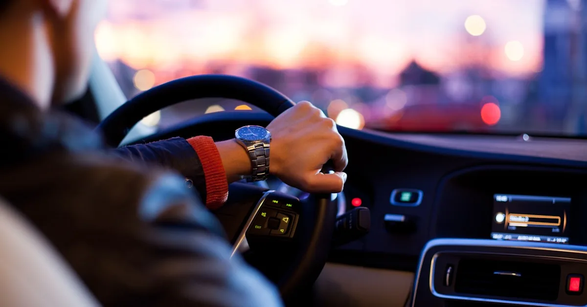Person driving a car on a UK motorway