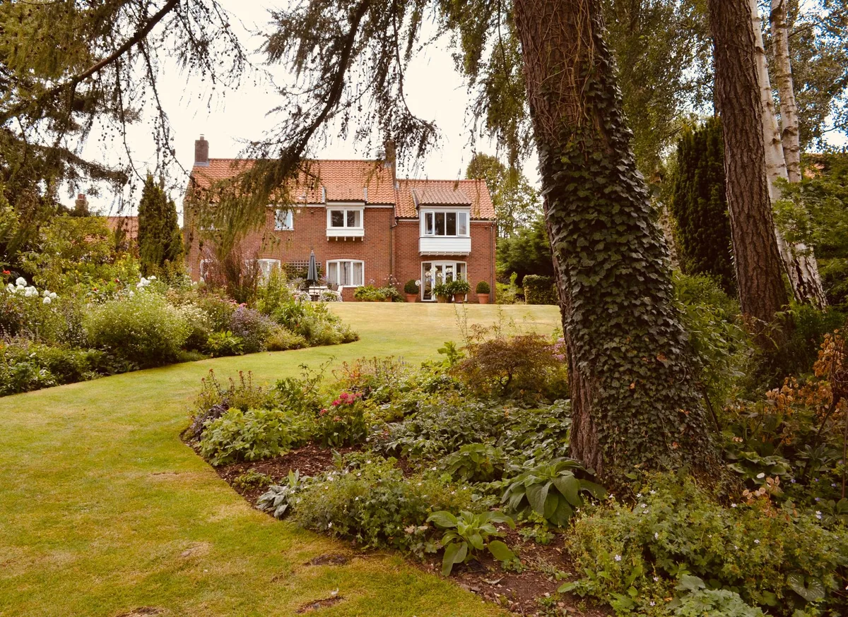 Modern UK residential home exterior representing home insurance cover