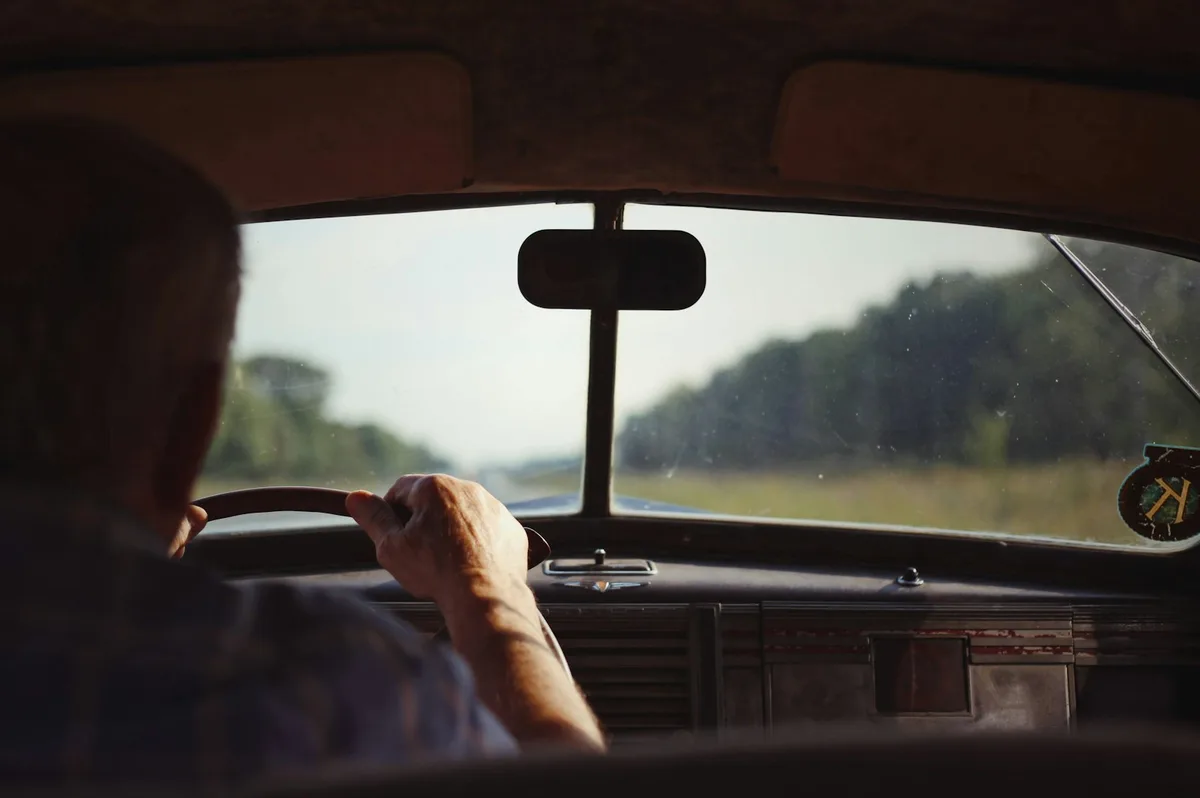 Car insurance documents with vehicle keys representing motor insurance decisions