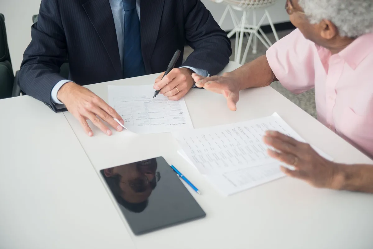 Healthcare planning documents with stethoscope and financial charts representing long-term care insurance preparation