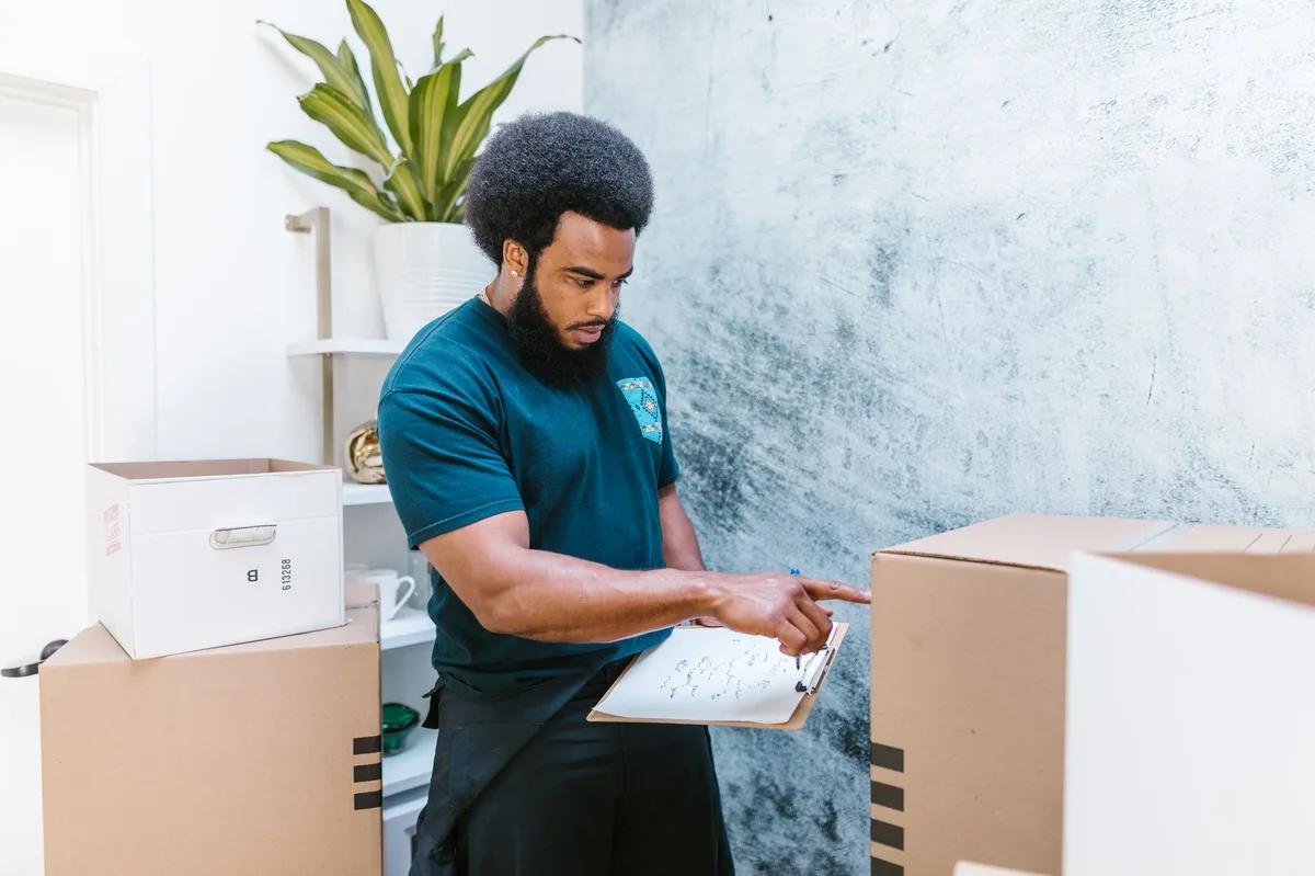 Tenant reviewing rental property inventory in modern apartment