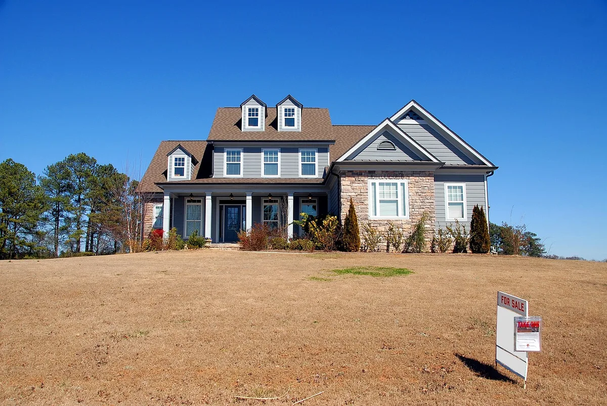Modern two-story residential home exterior representing property requiring home insurance