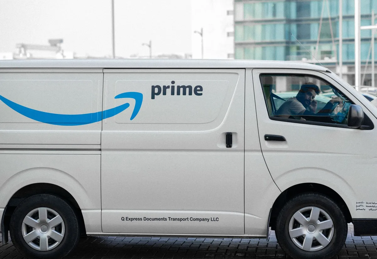 Person driving a van on a UK road
