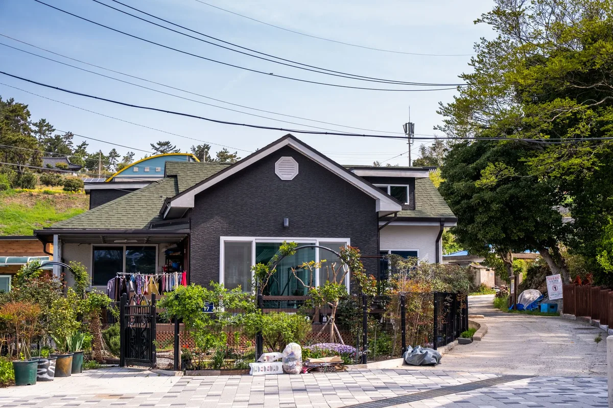 A residential house exterior representing home insurance coverage in the UK