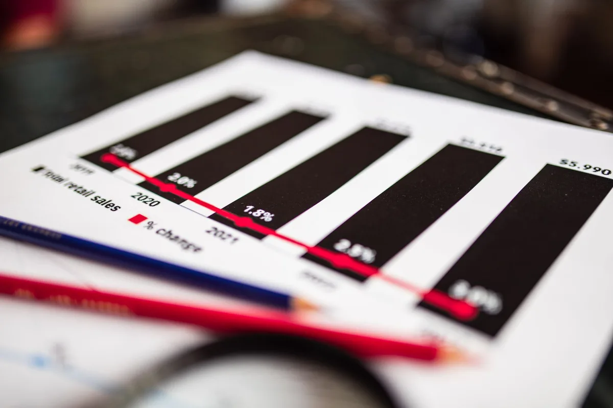 Rising bar chart showing financial growth and savings