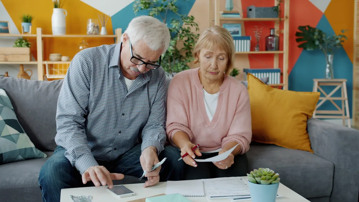 Family planning their financial future together around a table