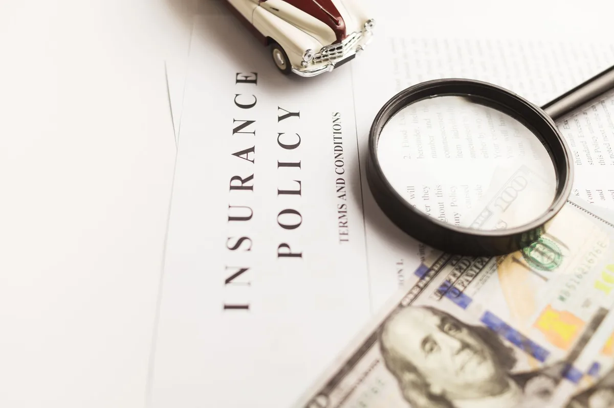 Car insurance concept with vehicle and protection