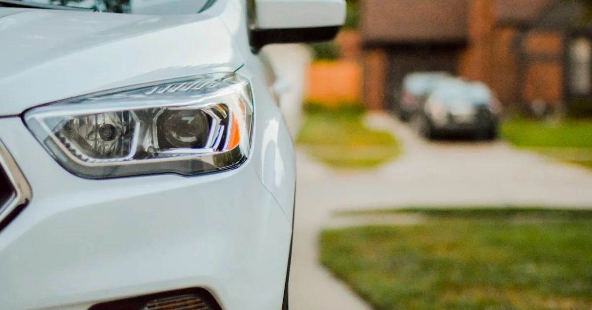 A close-up of a modern parked passenger car in a quiet parking spot during daylight