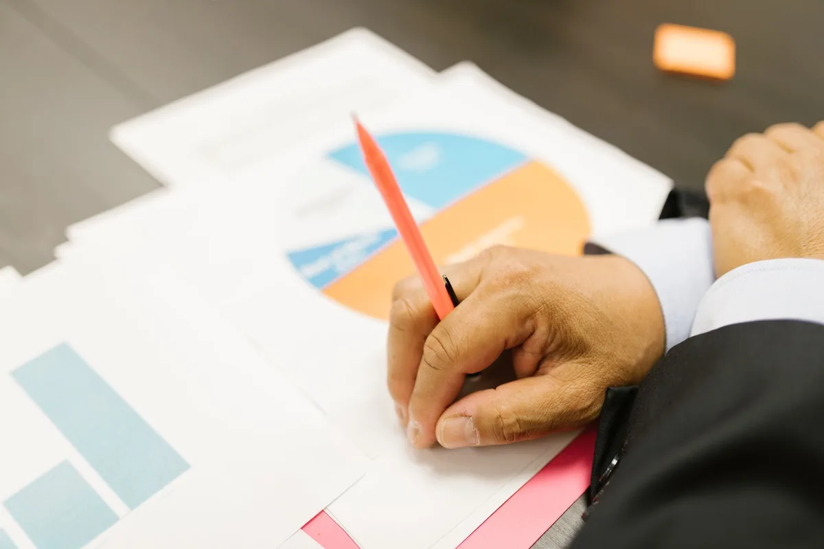 Close-up of personal financial documents and paperwork on a desk