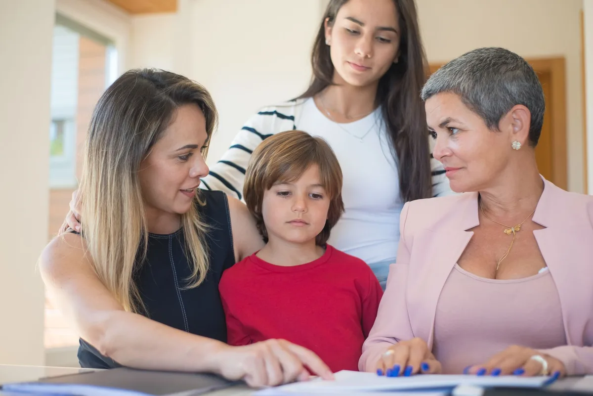Multi-generational family gathered together, representing long-term care planning discussions