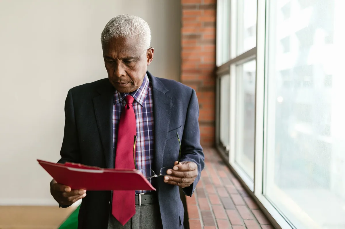 Healthcare professional reviewing insurance documents with patient