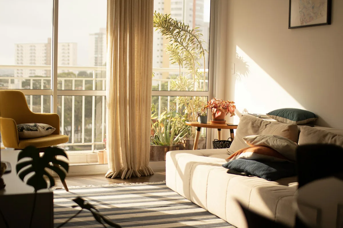 Modern apartment interior showing personal belongings and furniture