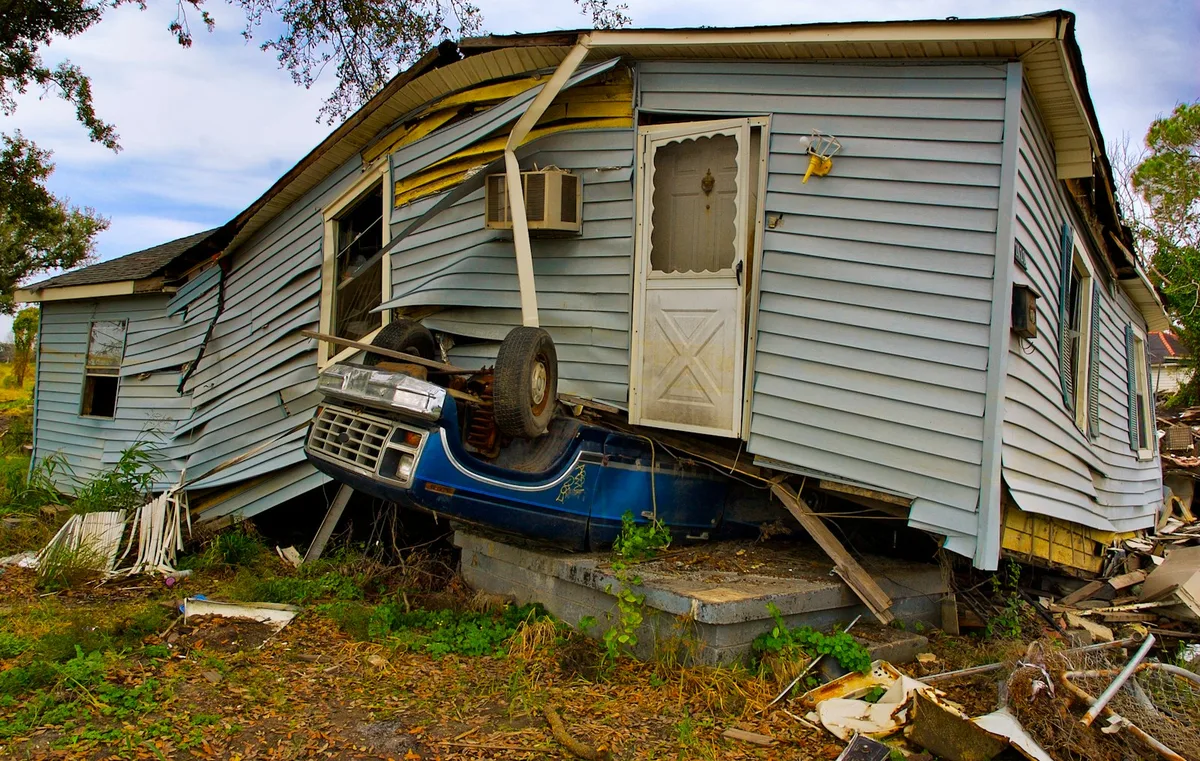 A home with paperwork representing homeowners insurance coverage.